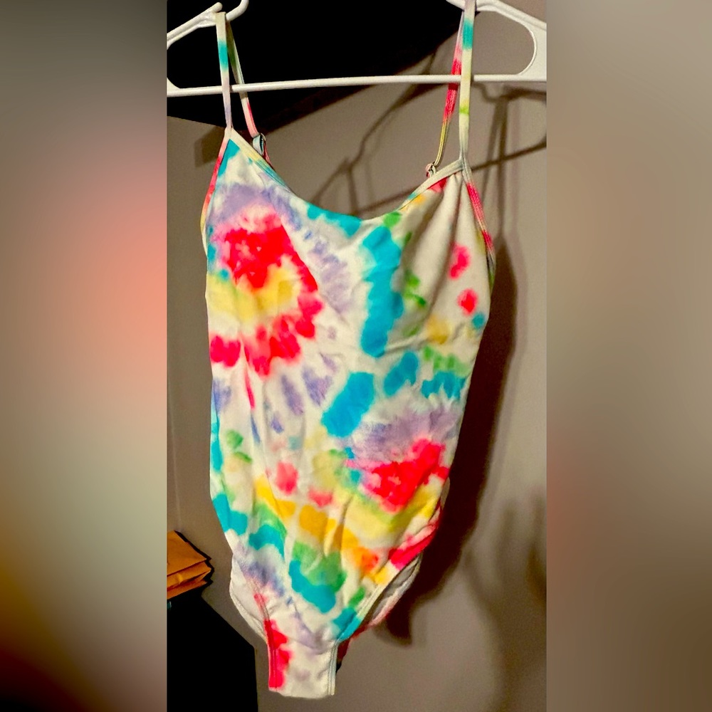 Brand new tied eyed swim suit. Never worn.